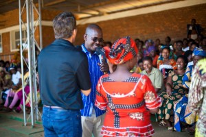 Dana Morey and Pastor Ian praying with women
