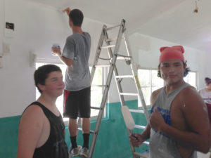 The team hard at work painting.