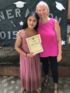 Sandra with a proud graduate